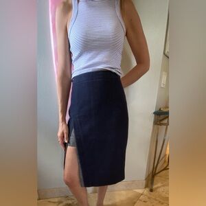 BCBG denim skirt with high side slit.